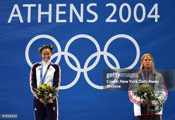 Amanda Beard of the U.S. Beams after swimming to a gold medal - the first in her brilliant career - in the women's 200-meter breaststroke at the 2004...
