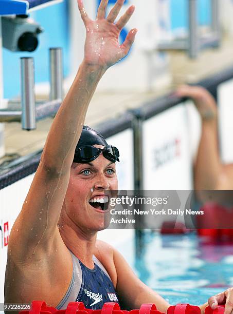 Amanda Beard of the U.S. Waves to fans after swimming to a gold medal - the first in her brilliant career - in the women's 200-meter breaststroke at...