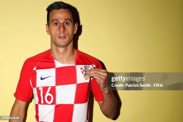 Nikola Kalinic of Croatia poses for a portrait during the official FIFA World Cup 2018 portrait session at Woodland Rhapsody Resort on June 12, 2018...