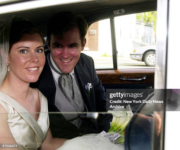 Amanda Kennedy Smith beams yesterday after her marriage to tax lawyer Carter Hood at Queen of the Most Holy Rosary Church in Bridgehampton, L.I....