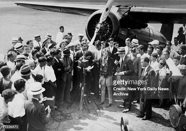 Amelia Earhart as she arrived at Newark Airport after second record for non-stop flight for women.