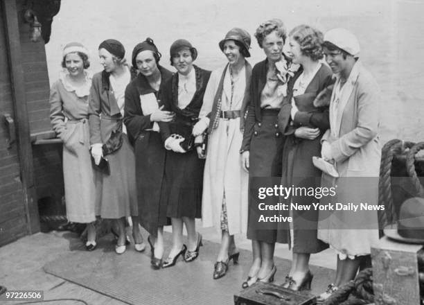 Amelia Earhart with her fellow women fliers. Novetoh Holmes, Mary Samson, Elvy Kalep, Ruth Elder Camp, Mrs. John T. Remey, Earhart, Elinor Smith and...