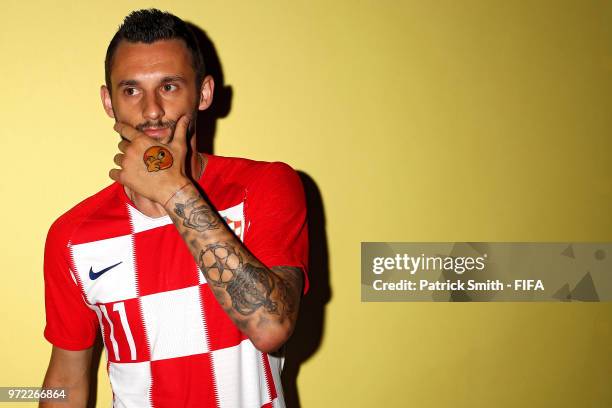 Marcelo Brozovic of Croatia poses for a portrait during the official FIFA World Cup 2018 portrait session at Woodland Rhapsody Resort on June 12,...
