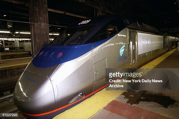 Amtrak's new high-speed Acela Express makes its entrance at Penn Station after its inaugural run from Washington. America's first bullet train then...