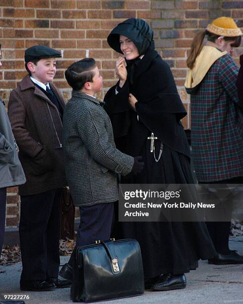 Amy Adams at the filming of the movie "Doubt" on St Lawrence Ave in the Bronx and the director -screenwriter John Patrick Shanley returns to his...
