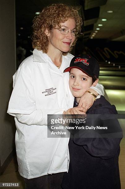 Amy Irving gives son Gabriel a hug at the Second Stage All-Star Bowling Classic at Leisure Time Recreation Bowling Center in the Port Authority Bus...
