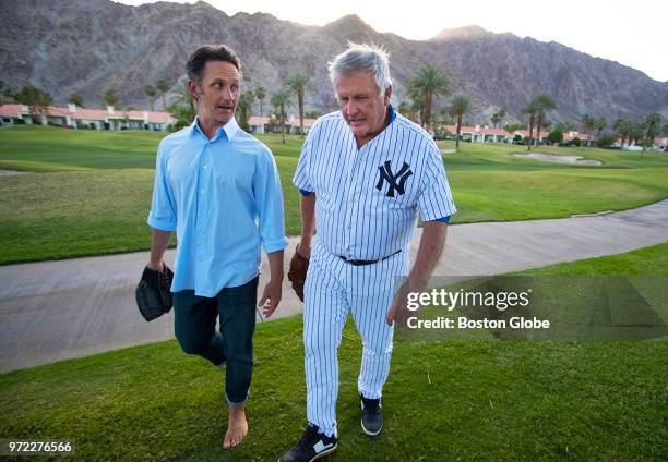 Tommy John, right, the 4 time All Star Major League Baseball pitcher who won 288 games, walks with his son Tommy John III, a chiropractor with a...