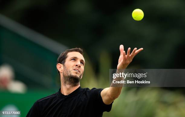 James Ward of Great Britain serves during his first round match against Tobias Simon of Germany on Day Four of the Nature Valley Open at Nottingham...
