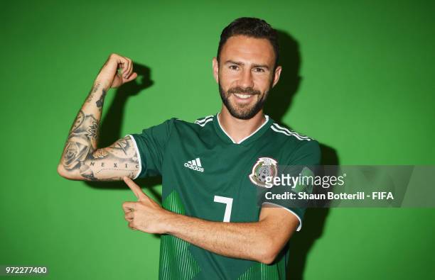Miguel Layun of Mexico poses for a portrait during the official FIFA World Cup 2018 portrait session at the team hotel on June 12, 2018 in Moscow,...
