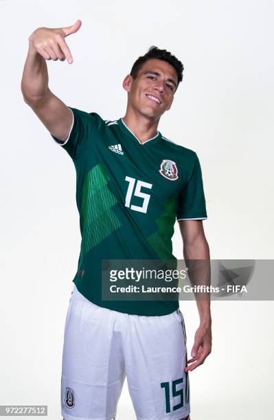 Hector Moreno of Mexico poses for a portrait during the official FIFA World Cup 2018 portrait session at the Team Hotel on June 12, 2018 in Moscow,...