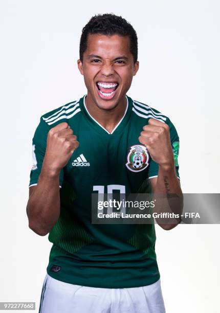 Giovani dos Santos of Mexico poses for a portrait during the official FIFA World Cup 2018 portrait session at the Team Hotel on June 12, 2018 in...
