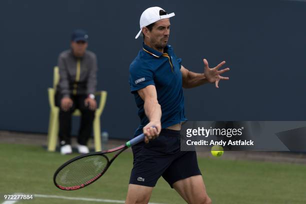 Guillermo Garcia-Lopez from Spain hits a forehand during his First Round, Men's Singles Match against Jeremy Chardy France on Day Two of the Libema...