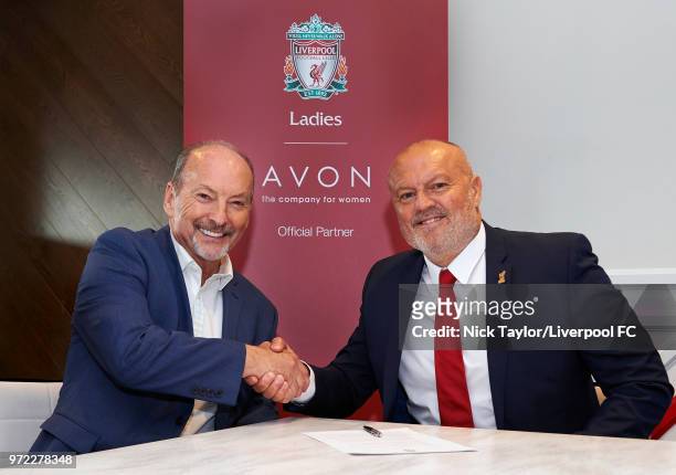 Neil Redfearn becomes the new manager of Liverpool Ladies with Liverpool FC CEO Peter Moore at Anfield on June 8, 2018 in Liverpool, England.