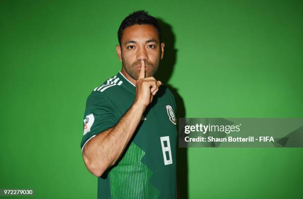 Marco Fabian of Mexico poses for a portrait during the official FIFA World Cup 2018 portrait session at the team hotel on June 12, 2018 in Moscow,...