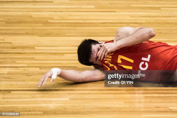 Sun Minghui of China gets injure during the 2018 Sino-Australian Men's Internationl Basketball Challenge match between the Chinese National Team and...