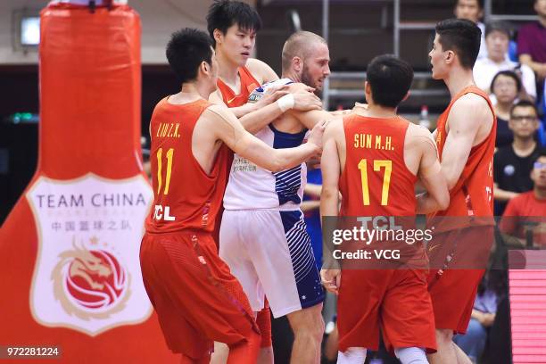 Jesse Wagstaff of Australia argues with Sun Minghui of China during the 2018 Sino-Australian Men's Internationl Basketball Challenge match between...