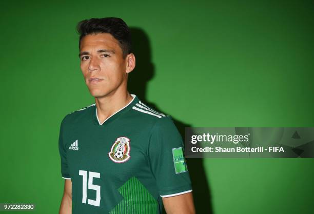 Hector Moreno of Mexico poses for a portrait during the official FIFA World Cup 2018 portrait session at the team hotel on June 12, 2018 in Moscow,...