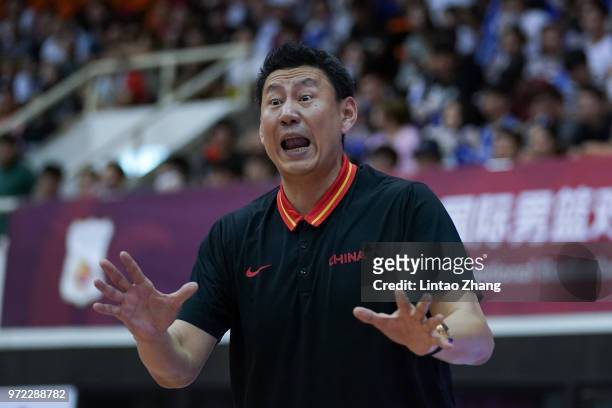 China head coach Li Nan addresses his players during the 2018 Sino-Australia Men's Internationl Basketball Challenge match between the Chinese...
