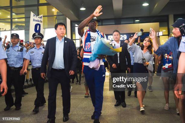 Senegalese striker Demba Ba arrives at Pudong International Airport on June 12, 2018 in Shanghai, China.