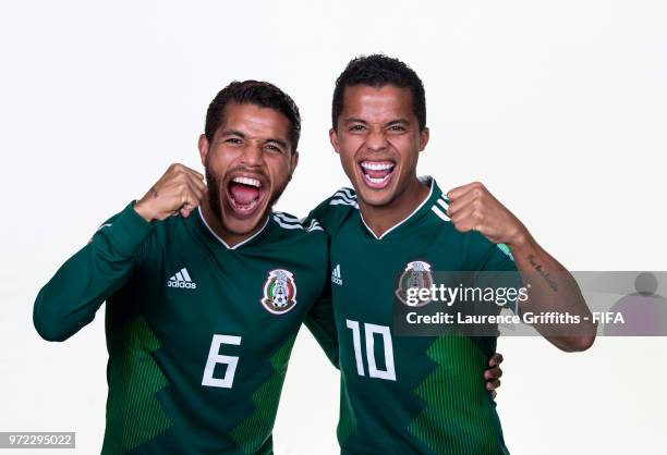 Jonathan dos Santos and Giovani dos Santos of Mexico pose for a portrait during the official FIFA World Cup 2018 portrait session at the Team Hotel...