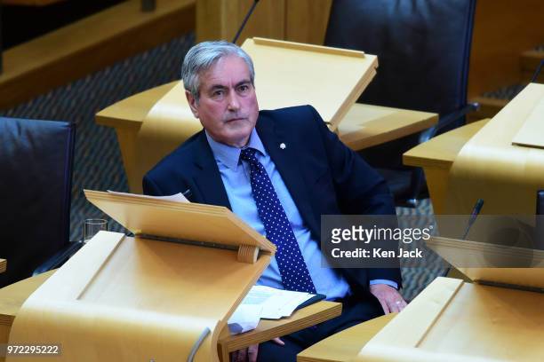 Scottish Labour education spokesperson Iain Gray listens to a ministerial statement on "Student Support" by Scottish Higher Education Minister...