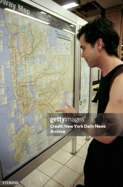 Andrew Cicchetti reads subway map at 36th St. And Fourth Ave. In Brooklyn.