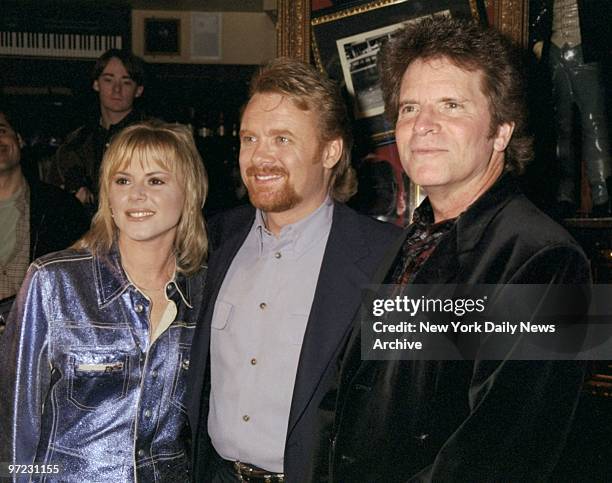 Anita Cochran, Lee Roy Parnell and John Fogerty at the Hard Rock Cafe for the 1998 Orville H. Gibson Awards.