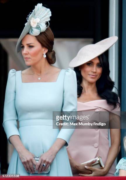 Catherine, Duchess of Cambridge and Meghan, Duchess of Sussex stand on the balcony of Buckingham Palace during Trooping The Colour 2018 on June 9,...