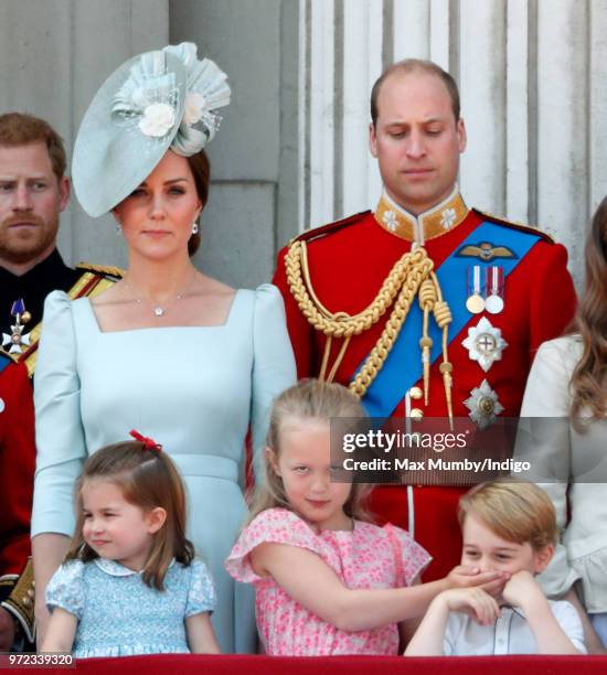 Catherine, Duchess of Cambridge, Princess Charlotte of Cambridge, Prince William, Duke of Cambridge and Savannah Phillips stand on the balcony of...