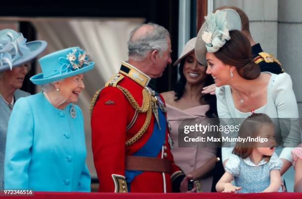 Queen Elizabeth II, Catherine, Duchess of Cambridge and Princess Charlotte of Cambridge stand on the balcony of Buckingham Palace during Trooping The...