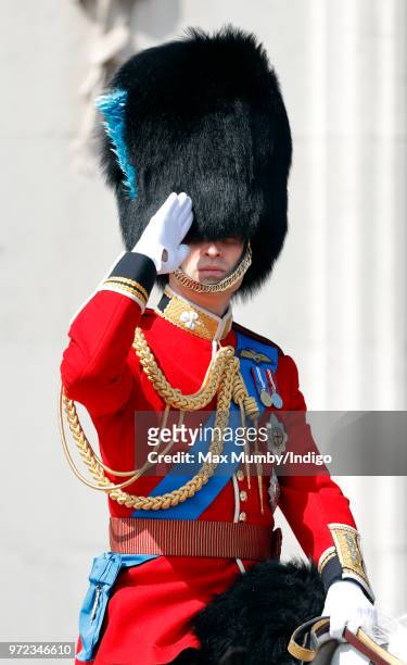 Prince William, Duke of Cambridge rides on horseback down The Mall during Trooping The Colour 2018 on June 9, 2018 in London, England. The annual...
