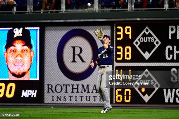 Christian Yelich of the Milwaukee Brewers catches a pop fly against the Philadelphia Phillies during the fifth inning at Citizens Bank Park on June...