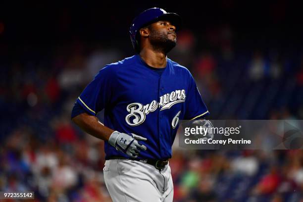Lorenzo Cain of the Milwaukee Brewers runs back to the dugout after flying out against the Philadelphia Phillies during the eighth inning at Citizens...