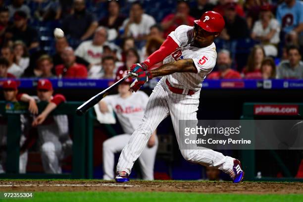 Nick Williams of the Philadelphia Phillies connects on a pitch against the Milwaukee Brewers during the eighth inning at Citizens Bank Park on June...