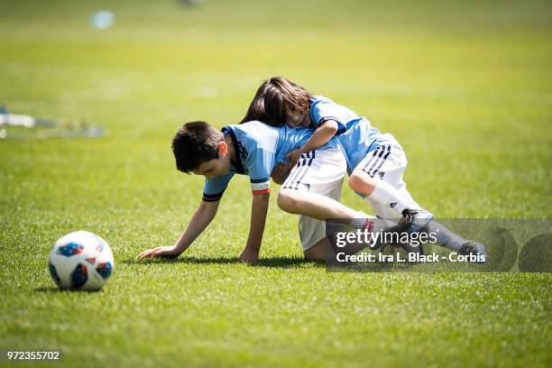 Kids of David Villa of New York City play on the pitch prior to the MLS match between New York City FC and Atlanta United FC at Yankee Stadium on...