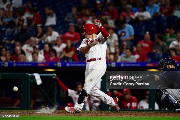 Scott Kingery of the Philadelphia Phillies hits a foul ball against the Milwaukee Brewers during the eighth inning at Citizens Bank Park on June 8,...