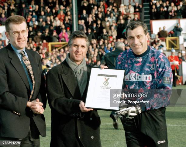 Peter Shilton of Leyton Orient receives a certificate from the publishers of the Guinness Book of Records before the Nationwide Football League...