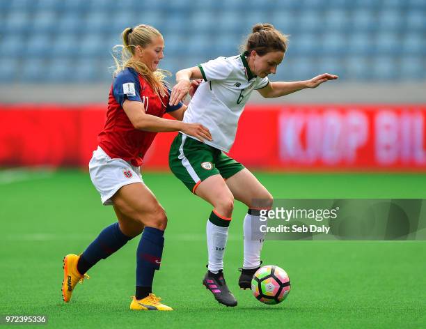 Stavanger , Norway - 12 June 2018; Karen Duggan of Republic of Ireland in action against Lisa-Marie Utland of Norway during the FIFA 2019 Women's...