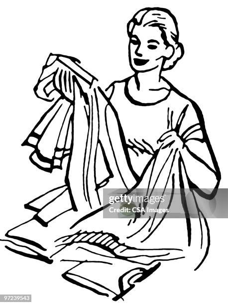woman folding laundry - folded laundry stock illustrations