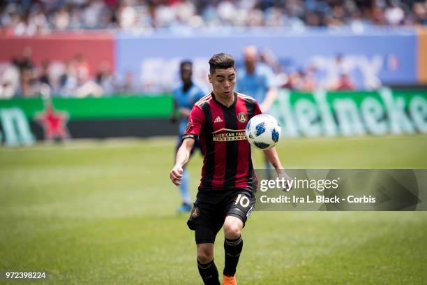 Miguel Almiron of Atlanta United keeps his eyes on the ball during the match between New York City FC and Atlanta United FC at Yankee Stadium on June...