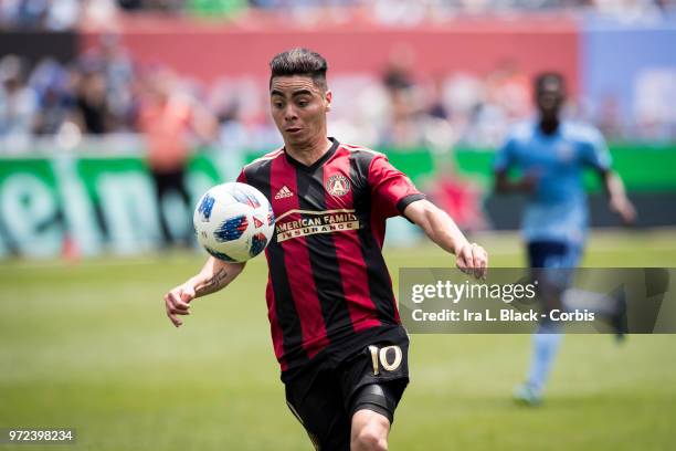 Miguel Almiron of Atlanta United keeps the ball in front of him during the match between New York City FC and Atlanta United FC at Yankee Stadium on...