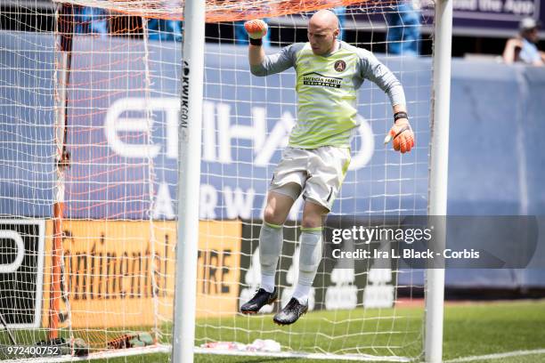 Goalkeeper Brad Guzan of Atlanta United jumps up to start the 2nd half during the match between New York City FC and Atlanta United FC at Yankee...