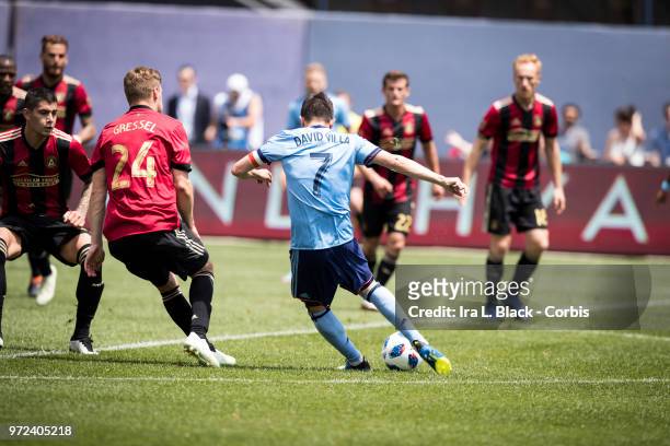 David Villa of New York City takes the shot on goal during the match between New York City FC and Atlanta United FC at Yankee Stadium on June 09,...