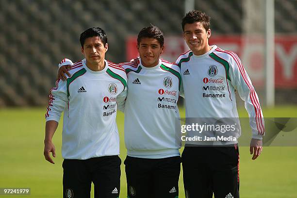 Mexico National team players Ricardo Osorio Jonathan dos Santos and Hector Moreno during a training session at Mexican Football Federation's High...