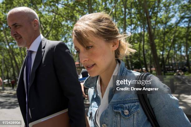 Actress Allison Mack arrives at the U.S. District Court for the Eastern District of New York for a status conference, June 12, 2018 in the Brooklyn...