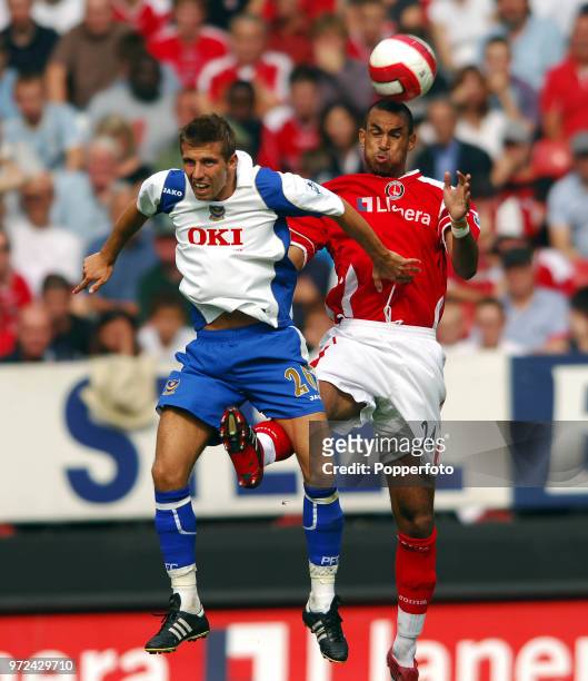Gary O'Neil of Portsmouth and Jonathan Fortune of Charlton Athletic in action during the Barclay's Premiership match between Charlton Athletic and...