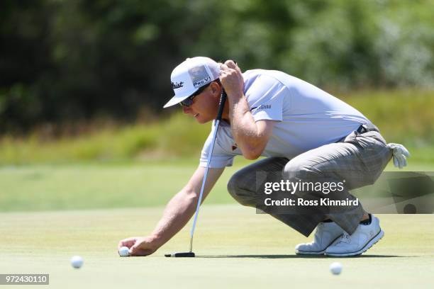 Charley Hoffman of the United States prepares to putt on the second green during a practice round prior to the 2018 U.S. Open at Shinnecock Hills...