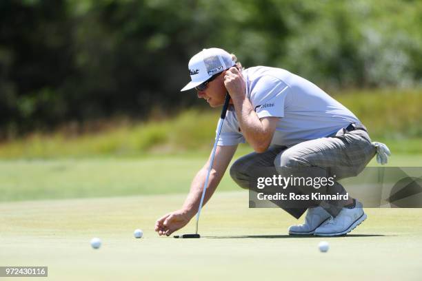 Charley Hoffman of the United States prepares to putt on the second green during a practice round prior to the 2018 U.S. Open at Shinnecock Hills...