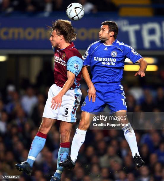 Andriy Shevchenko of Chelsea and Martin Laursen of Aston Villa in action during the 4th round Carling Cup match between Chelsea and Aston Villa at...