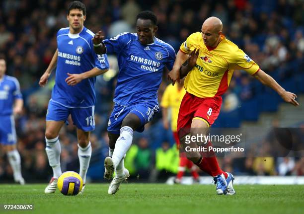 Michael Essien of Chelsea is challenged by Gavin Mahon of Watford during the Barclays Premiership match between Chelsea and Watford at Stamford...